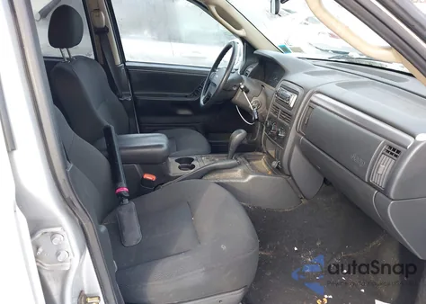 2004 Jeep Grand Cherokee Laredo z USA, uszkodzony, nr VIN 1J4GW48S74C307819